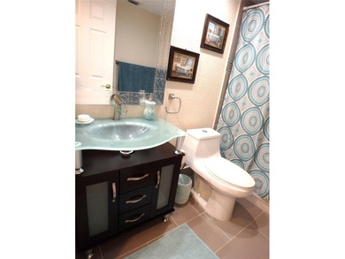 Welcome to luxury 55+ living at Wynmoor Country Club! This on Wynmoor Golf Course in Florida - for sale on GolfHomes.com, golf home, golf lot