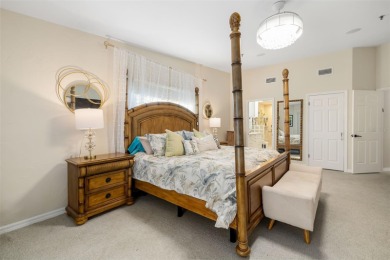 This expansive villa offers the space and comfort of a private on Longboat Key Golf Club Resort in Florida - for sale on GolfHomes.com, golf home, golf lot