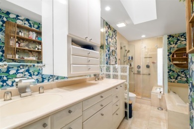 This expansive villa offers the space and comfort of a private on Longboat Key Golf Club Resort in Florida - for sale on GolfHomes.com, golf home, golf lot