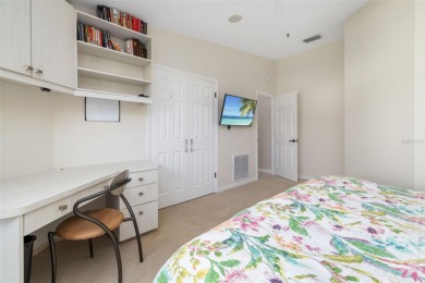 This expansive villa offers the space and comfort of a private on Longboat Key Golf Club Resort in Florida - for sale on GolfHomes.com, golf home, golf lot