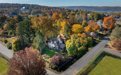 This magnificent 5-to-6-bedroom stately stucco home is unique in on Ardsley Country Club in New York - for sale on GolfHomes.com, golf home, golf lot