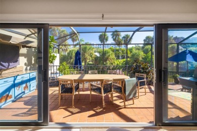 This expansive villa offers the space and comfort of a private on Longboat Key Golf Club Resort in Florida - for sale on GolfHomes.com, golf home, golf lot