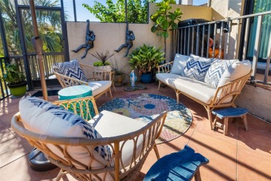 This expansive villa offers the space and comfort of a private on Longboat Key Golf Club Resort in Florida - for sale on GolfHomes.com, golf home, golf lot