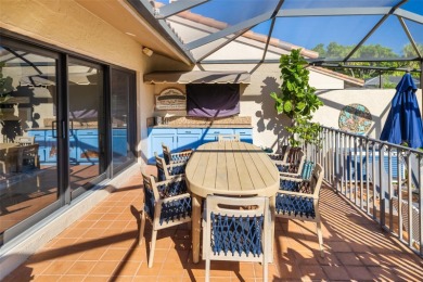 This expansive villa offers the space and comfort of a private on Longboat Key Golf Club Resort in Florida - for sale on GolfHomes.com, golf home, golf lot