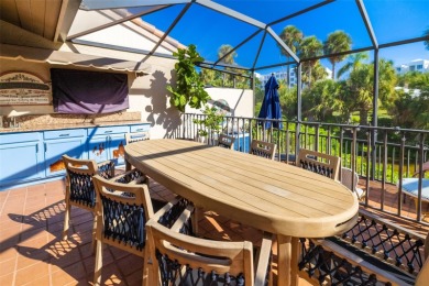 This expansive villa offers the space and comfort of a private on Longboat Key Golf Club Resort in Florida - for sale on GolfHomes.com, golf home, golf lot