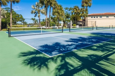 This expansive villa offers the space and comfort of a private on Longboat Key Golf Club Resort in Florida - for sale on GolfHomes.com, golf home, golf lot