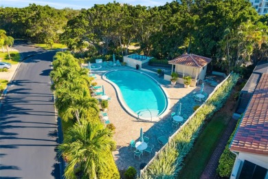 This expansive villa offers the space and comfort of a private on Longboat Key Golf Club Resort in Florida - for sale on GolfHomes.com, golf home, golf lot