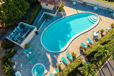 This expansive villa offers the space and comfort of a private on Longboat Key Golf Club Resort in Florida - for sale on GolfHomes.com, golf home, golf lot