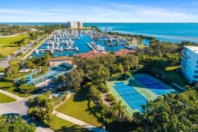 This expansive villa offers the space and comfort of a private on Longboat Key Golf Club Resort in Florida - for sale on GolfHomes.com, golf home, golf lot