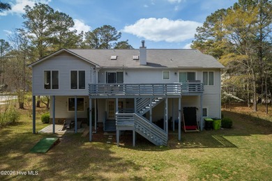Step into a home that truly hits it out of the park, offering on Harbour Point Golf Club in North Carolina - for sale on GolfHomes.com, golf home, golf lot