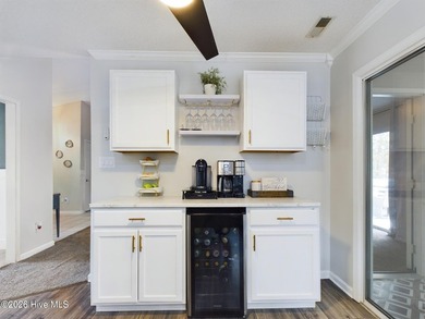 Step into a home that truly hits it out of the park, offering on Harbour Point Golf Club in North Carolina - for sale on GolfHomes.com, golf home, golf lot