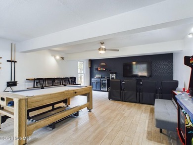 Step into a home that truly hits it out of the park, offering on Harbour Point Golf Club in North Carolina - for sale on GolfHomes.com, golf home, golf lot