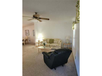 Welcome to our vibrant 55+ Villages community! This unfurnished on Orange Blossom Hills Golf and Country Club in Florida - for sale on GolfHomes.com, golf home, golf lot
