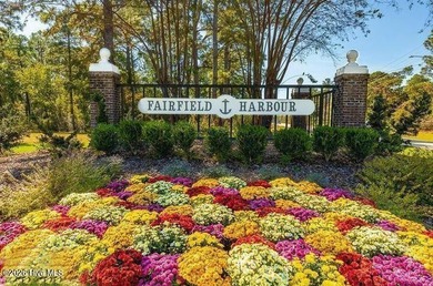 4 bedrooms, 3.5 baths, PLUS a bonus room!! The master suite is a on Harbour Point Golf Club in North Carolina - for sale on GolfHomes.com, golf home, golf lot