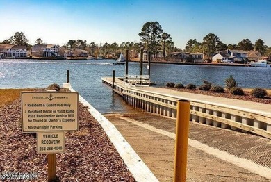 4 bedrooms, 3.5 baths, PLUS a bonus room!! The master suite is a on Harbour Point Golf Club in North Carolina - for sale on GolfHomes.com, golf home, golf lot