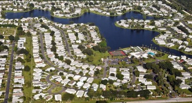 Discover resort-style living in this charming home ideally on The Club At Pointe West in Florida - for sale on GolfHomes.com, golf home, golf lot