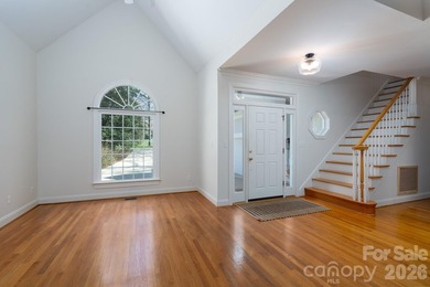 Don't miss this charming cottage with serene lake views in the on Old North State Club at Uwharrie Point Golf community in North Carolina - for sale on GolfHomes.com, golf home, golf lot