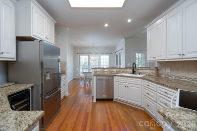 Don't miss this charming cottage with serene lake views in the on Old North State Club at Uwharrie Point Golf community in North Carolina - for sale on GolfHomes.com, golf home, golf lot