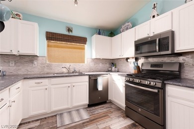 LOCATED IN THE DESIRABLE GUARD-GATED GOLF COURSE COMMUNITY OF on Stallion Mountain Golf Course in Nevada - for sale on GolfHomes.com, golf home, golf lot