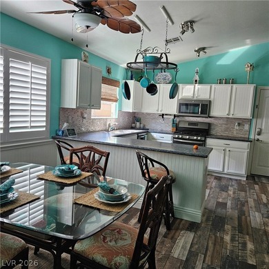 LOCATED IN THE DESIRABLE GUARD-GATED GOLF COURSE COMMUNITY OF on Stallion Mountain Golf Course in Nevada - for sale on GolfHomes.com, golf home, golf lot