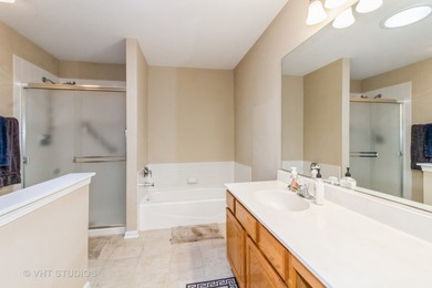 Move right into this beautifully maintained Cartier model ranch on The Links at Carillon in Illinois - for sale on GolfHomes.com, golf home, golf lot