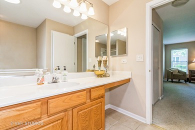 Move right into this beautifully maintained Cartier model ranch on The Links at Carillon in Illinois - for sale on GolfHomes.com, golf home, golf lot