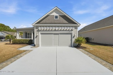 Coastal Charm Awaits You in Ocean Isle Beach. Sunset Ridge is on Ocean Ridge Plantation in North Carolina - for sale on GolfHomes.com, golf home, golf lot