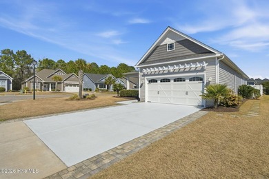 Coastal Charm Awaits You in Ocean Isle Beach. Sunset Ridge is on Ocean Ridge Plantation in North Carolina - for sale on GolfHomes.com, golf home, golf lot