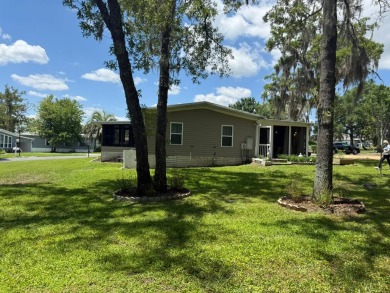 This magnificent double-wide mobile home in the desirable on Rolling Greens Executive Golf Community in Florida - for sale on GolfHomes.com, golf home, golf lot