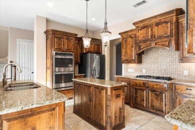 Stunning two-story Highland Home featuring a fantastic floor on The Lakes at Castle Hill Golf Club in Texas - for sale on GolfHomes.com, golf home, golf lot
