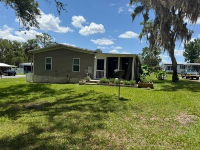 This magnificent double-wide mobile home in the desirable on Rolling Greens Executive Golf Community in Florida - for sale on GolfHomes.com, golf home, golf lot