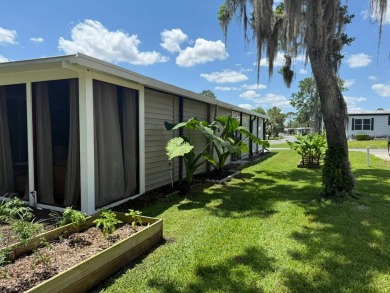 This magnificent double-wide mobile home in the desirable on Rolling Greens Executive Golf Community in Florida - for sale on GolfHomes.com, golf home, golf lot