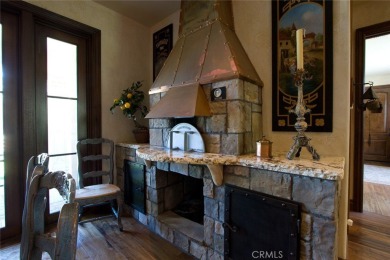 Step inside a timeless Old-World European retreat where every on Spanish Hills Golf and Country Club in California - for sale on GolfHomes.com, golf home, golf lot