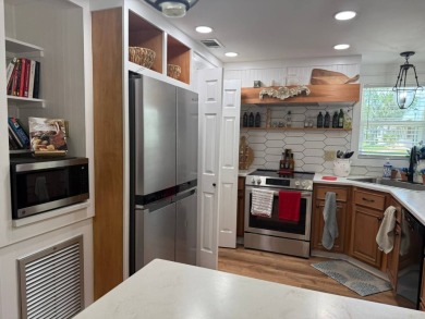 This magnificent double-wide mobile home in the desirable on Rolling Greens Executive Golf Community in Florida - for sale on GolfHomes.com, golf home, golf lot