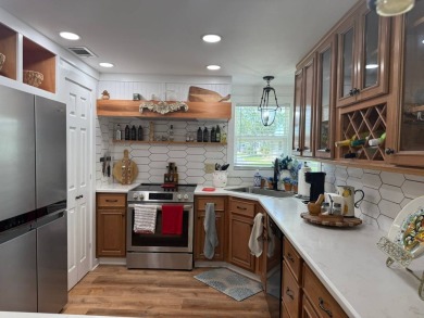This magnificent double-wide mobile home in the desirable on Rolling Greens Executive Golf Community in Florida - for sale on GolfHomes.com, golf home, golf lot