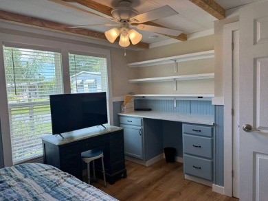 This magnificent double-wide mobile home in the desirable on Rolling Greens Executive Golf Community in Florida - for sale on GolfHomes.com, golf home, golf lot