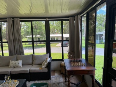 This magnificent double-wide mobile home in the desirable on Rolling Greens Executive Golf Community in Florida - for sale on GolfHomes.com, golf home, golf lot