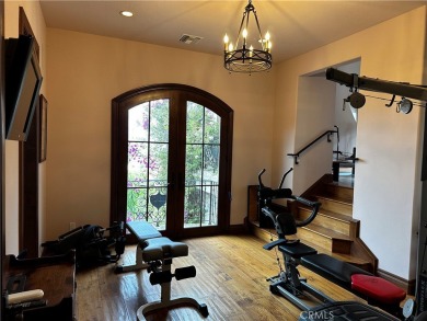 Step inside a timeless Old-World European retreat where every on Spanish Hills Golf and Country Club in California - for sale on GolfHomes.com, golf home, golf lot