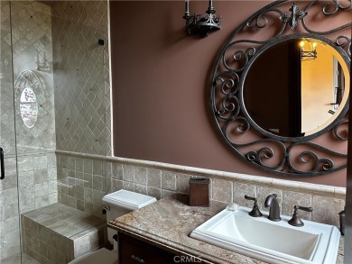 Step inside a timeless Old-World European retreat where every on Spanish Hills Golf and Country Club in California - for sale on GolfHomes.com, golf home, golf lot
