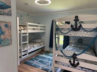 This magnificent double-wide mobile home in the desirable on Rolling Greens Executive Golf Community in Florida - for sale on GolfHomes.com, golf home, golf lot