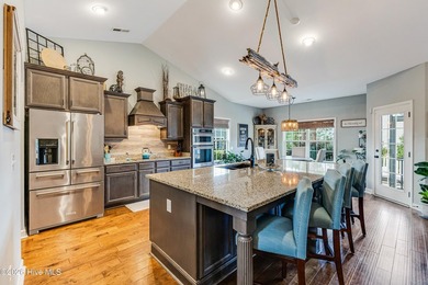 Located at the end of a quiet cul-de-sac in the prestigious golf on Brunswick Plantation and Golf Resorts in North Carolina - for sale on GolfHomes.com, golf home, golf lot