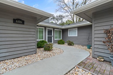 Welcome to your adorable beach retreat in the amenity-rich on Sea Trail Golf Resort in North Carolina - for sale on GolfHomes.com, golf home, golf lot
