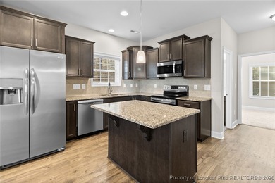 Welcome to this beautiful 4-bedroom, 3-bath home with an office on Anderson Creek Golf Club in North Carolina - for sale on GolfHomes.com, golf home, golf lot