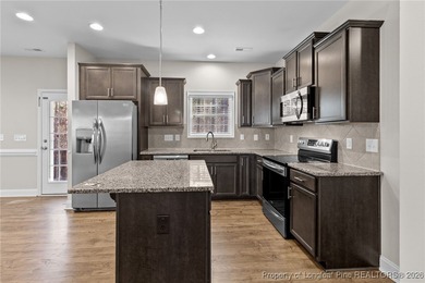 Welcome to this beautiful 4-bedroom, 3-bath home with an office on Anderson Creek Golf Club in North Carolina - for sale on GolfHomes.com, golf home, golf lot