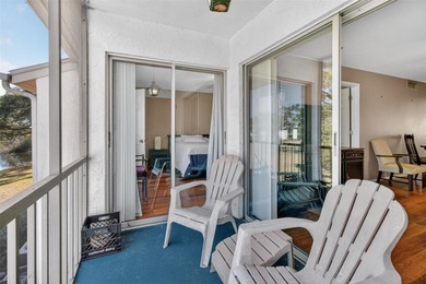 Relax and enjoy the serene views from your screened on East Lake Woodlands Country Club in Florida - for sale on GolfHomes.com, golf home, golf lot