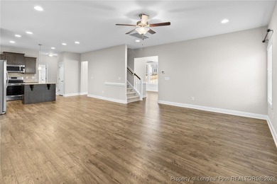 Welcome to this beautiful 4-bedroom, 3-bath home with an office on Anderson Creek Golf Club in North Carolina - for sale on GolfHomes.com, golf home, golf lot