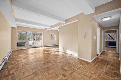 Commuter's dream! 1,200 square foot corner apartment with golf on Scarsdale Golf Club in New York - for sale on GolfHomes.com, golf home, golf lot