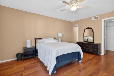 Relax and enjoy the serene views from your screened on East Lake Woodlands Country Club in Florida - for sale on GolfHomes.com, golf home, golf lot