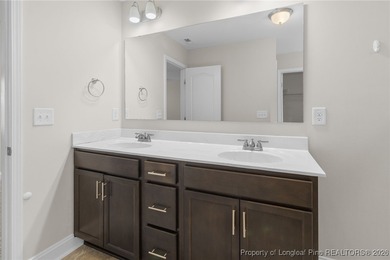 Welcome to this beautiful 4-bedroom, 3-bath home with an office on Anderson Creek Golf Club in North Carolina - for sale on GolfHomes.com, golf home, golf lot