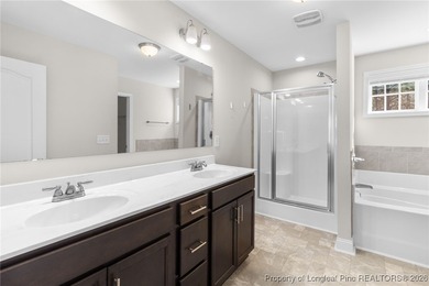 Welcome to this beautiful 4-bedroom, 3-bath home with an office on Anderson Creek Golf Club in North Carolina - for sale on GolfHomes.com, golf home, golf lot